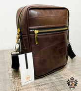 Elevate Your Style with Our Premium Cross-Body Leather Bag Made from high-quality, supple leather for a luxurious feel Timeless design with a classic, sophisticated aesthetic Spacious interior with organized compartments for effortless storage Adjustable strap for a customizable, comfortable fit Perfect for work, travel, or as a style accessory